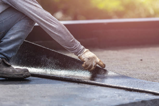 Professional Emergency Waterproofing technician working in Fayetteville, OH